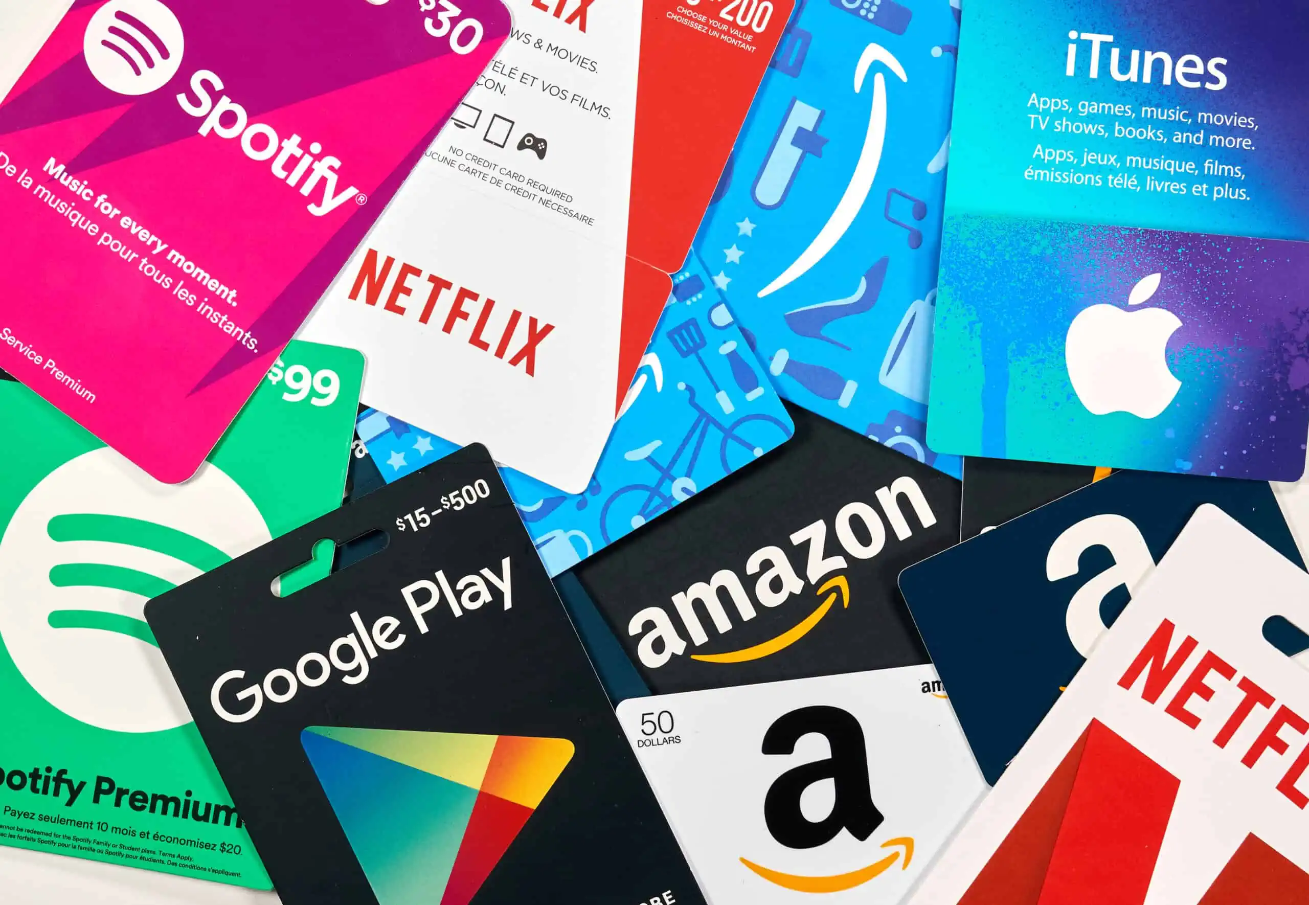 Different gift cards of many brands such as Amazon, Netflix, Xbox, Google Play, Best Buy, Spotify