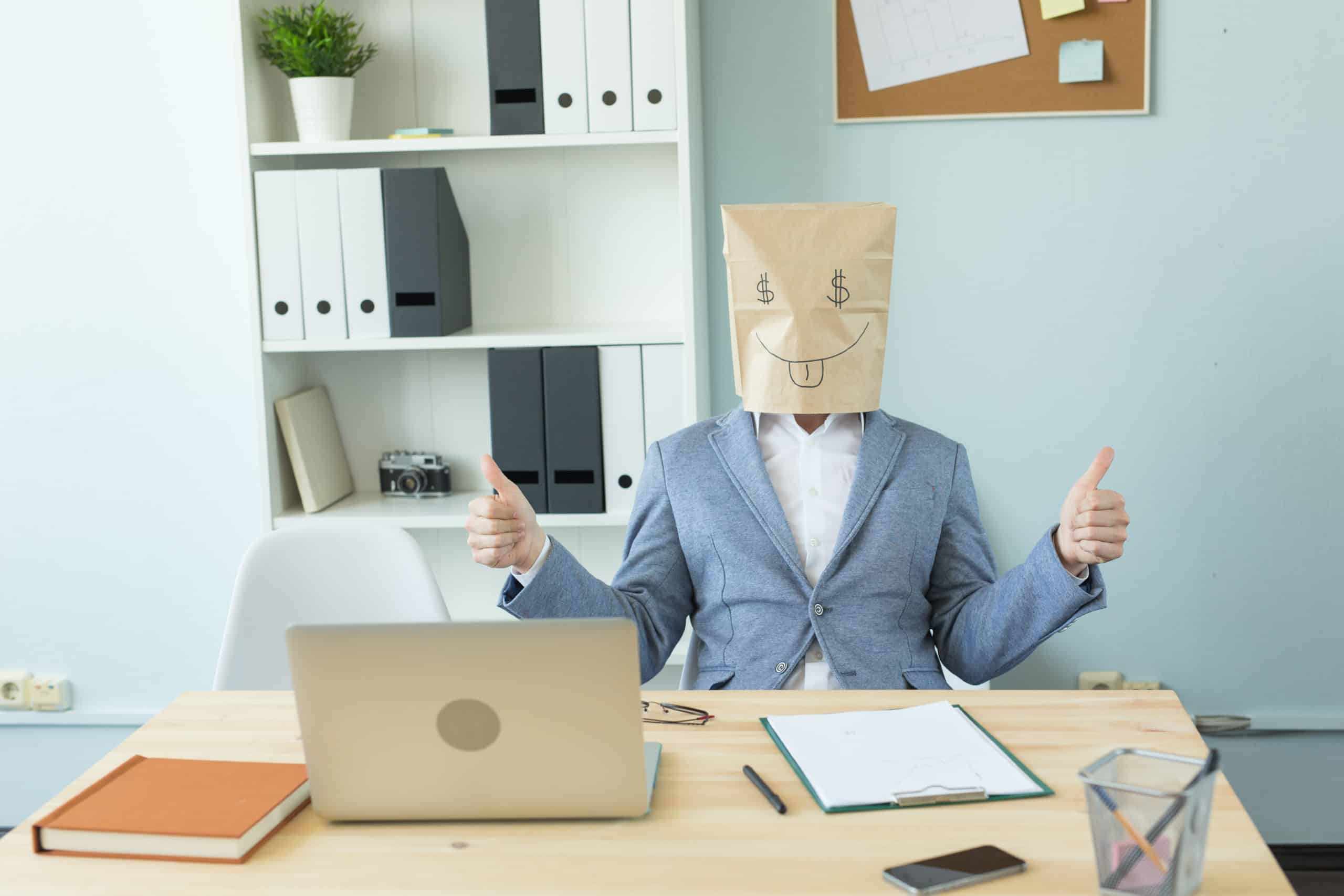 Poor Advice to pay a credit early from fake expert hiding behind a computer with a bag on their head to hide their identity