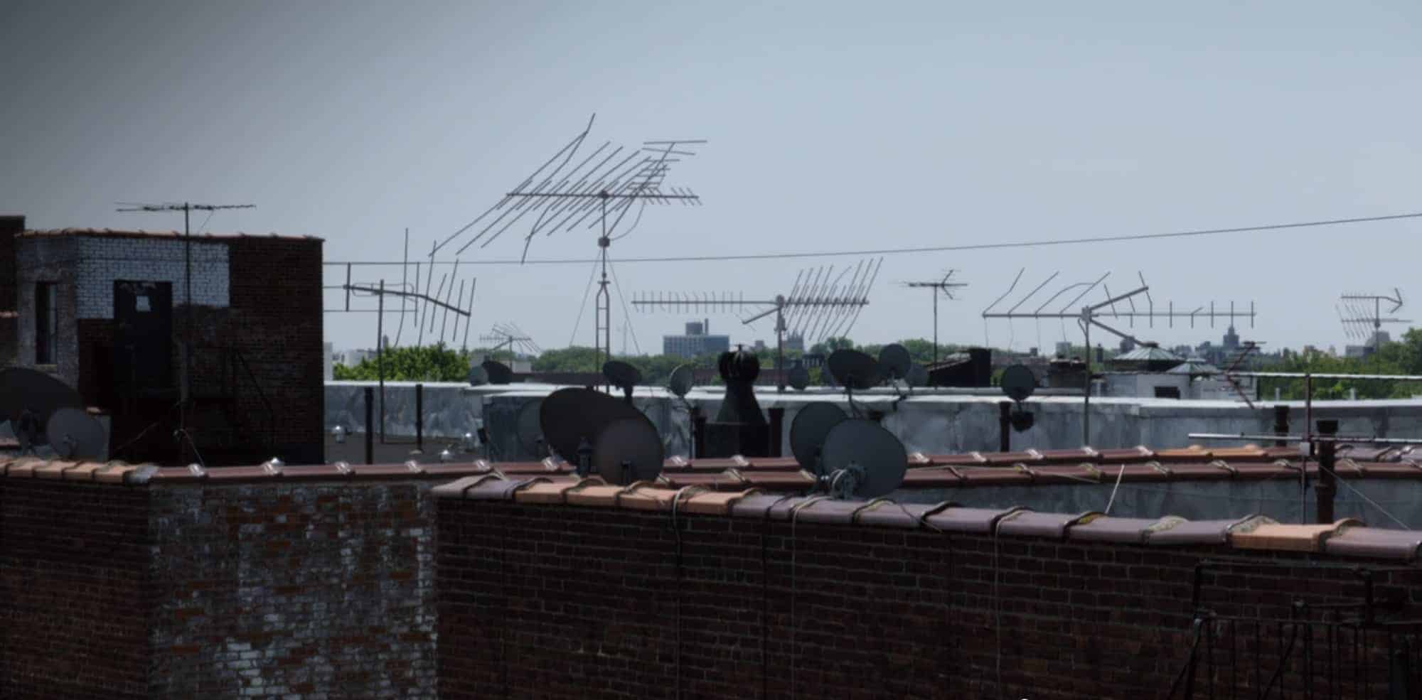 Rooftops in Brooklyn, NY with over-the-air television antennas installed.