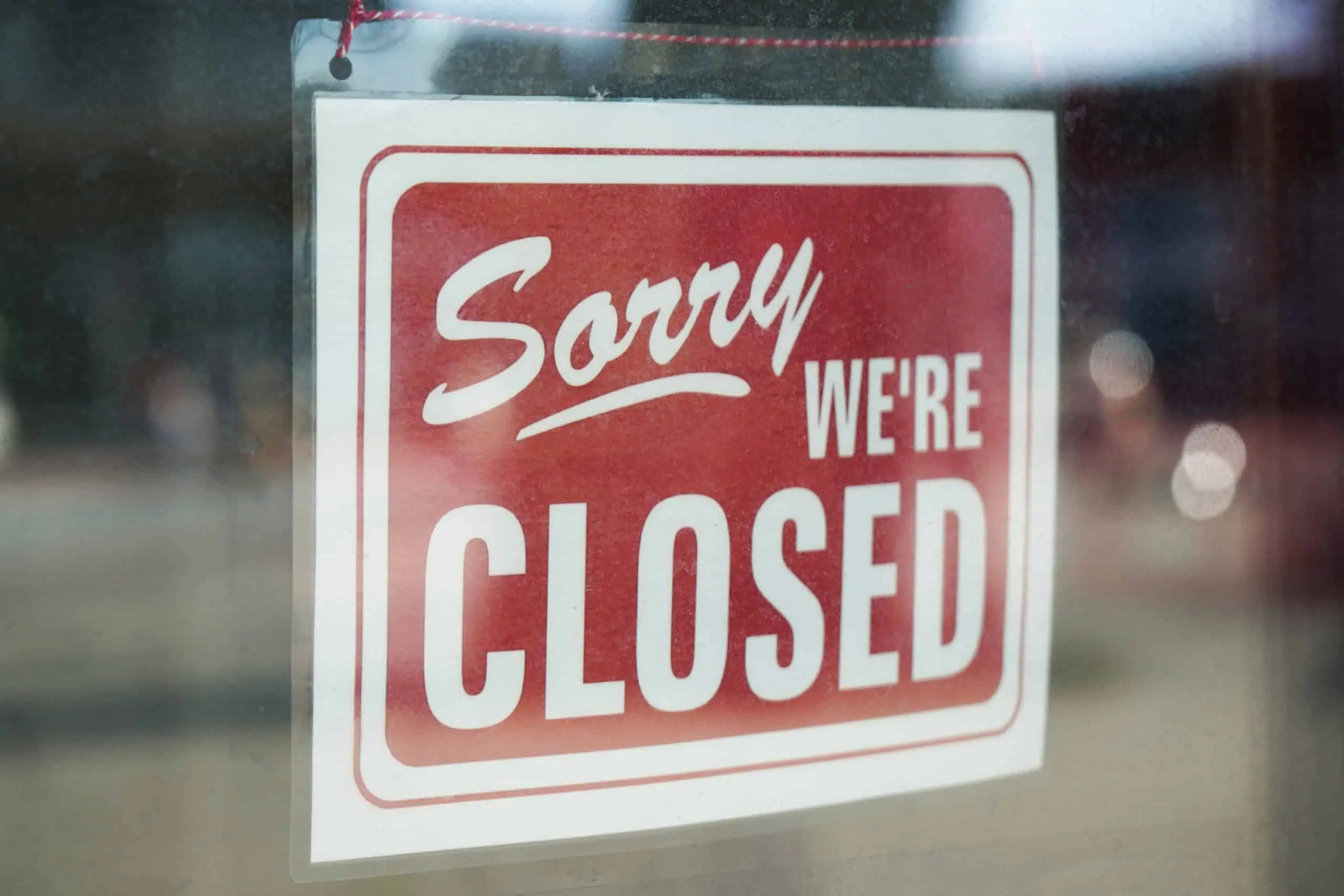 Sign on seasonal tax preparation office "Sorry We're Closed"